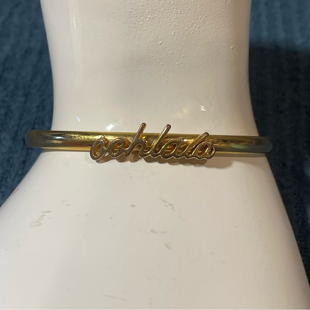 Kate Spade “Oh La La” Gold Tone Cuff Bracelet